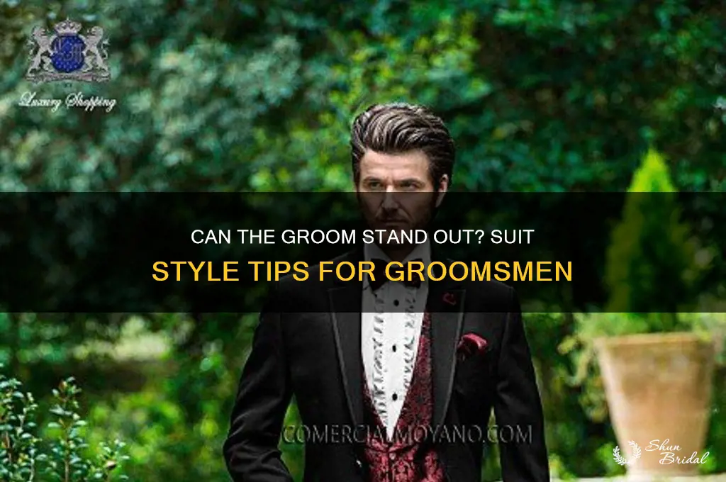 can groom wear different suit groomsmen