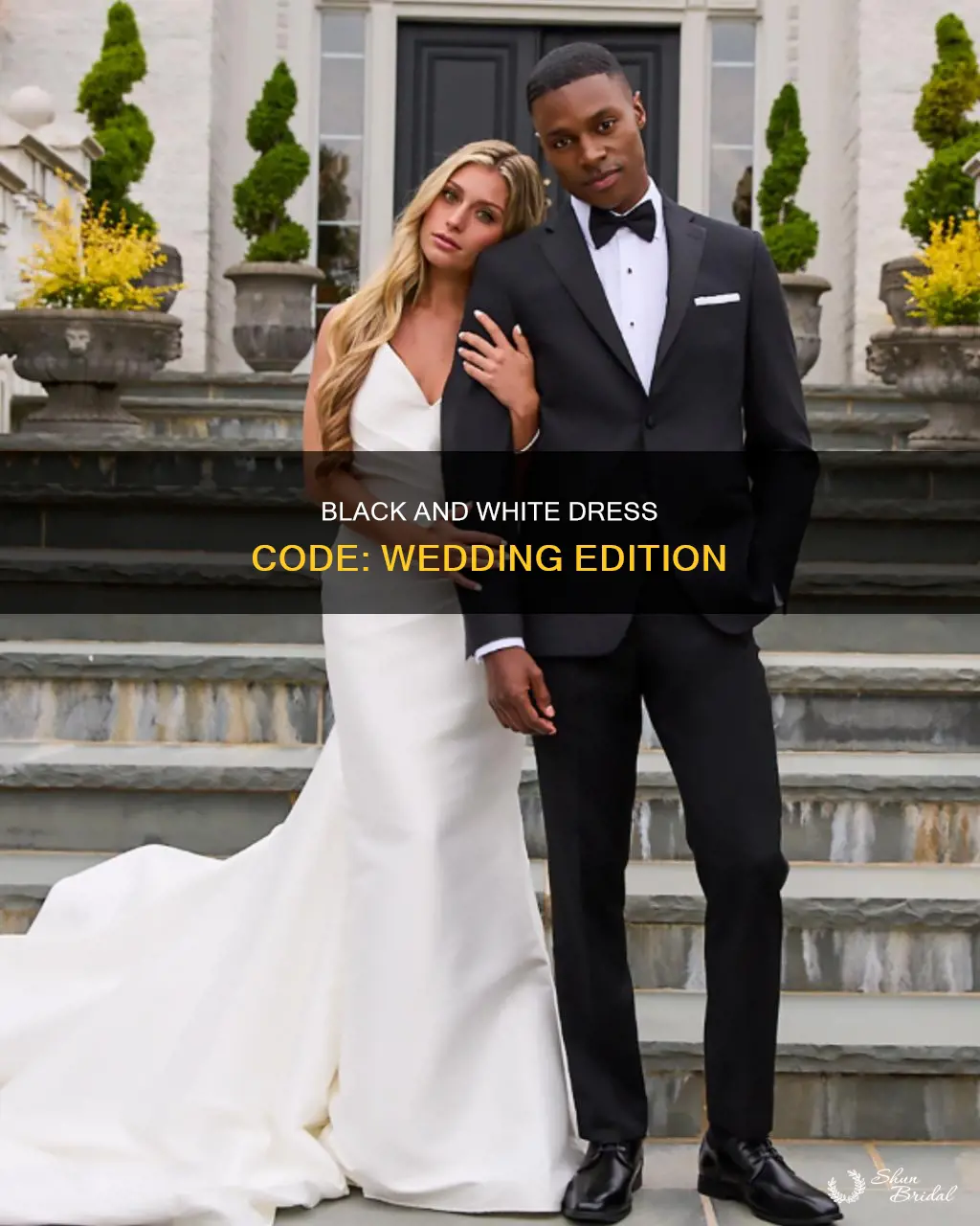 can I wear black and white dress to wedding