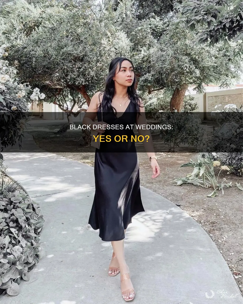 can you ear a black dress to a wedding