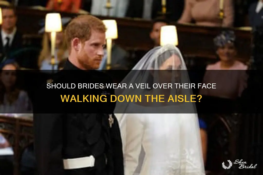 do brides walk down the aisle with veil over face