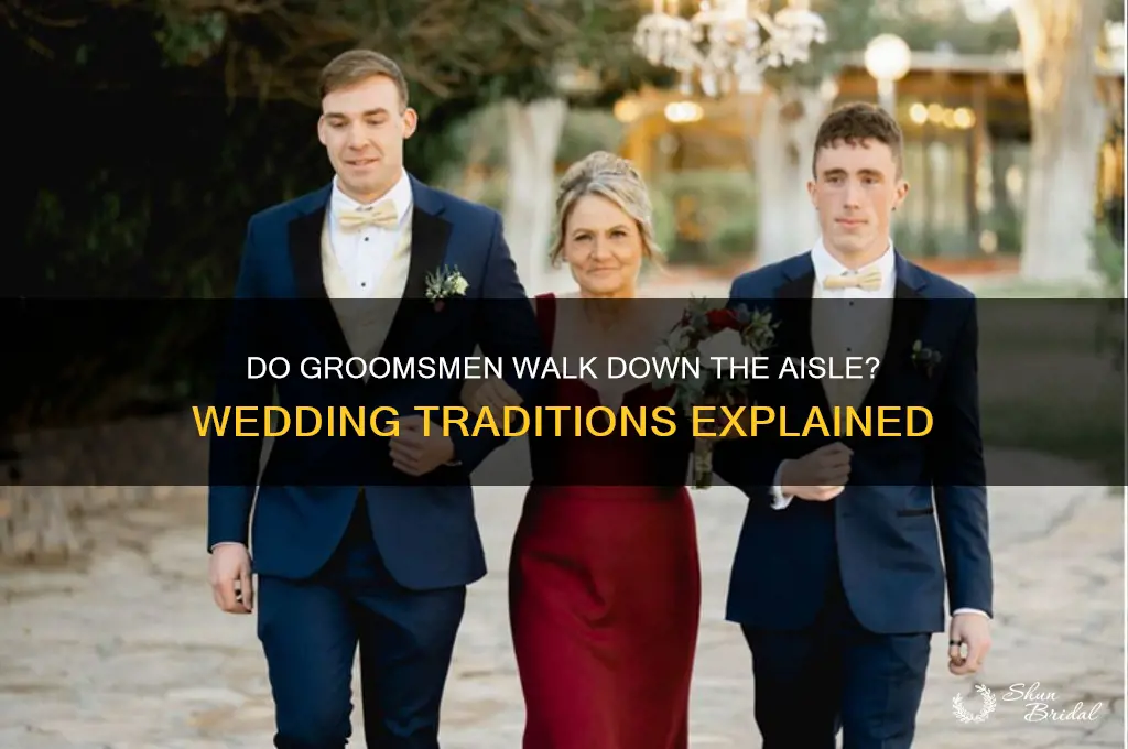 do groomsmen walk down the aisle