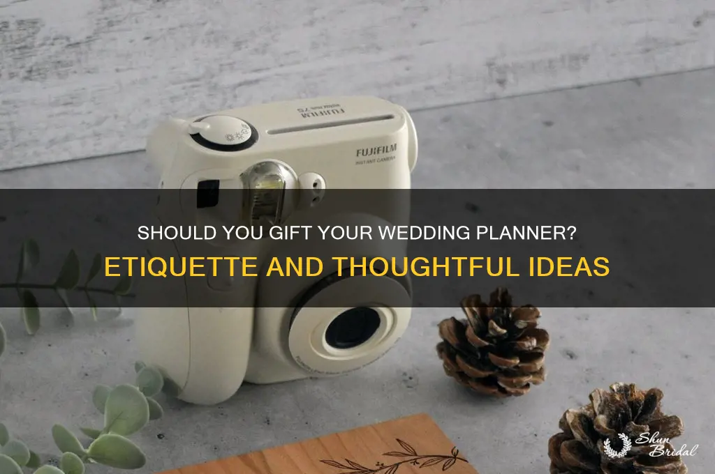 do you buy your wedding planner a gift