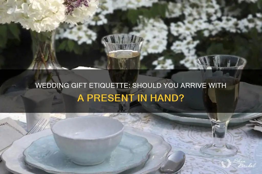 do you show up to the wedding with a gift