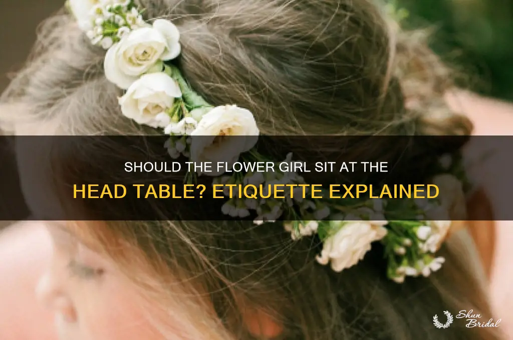 does flower girl sit at head table