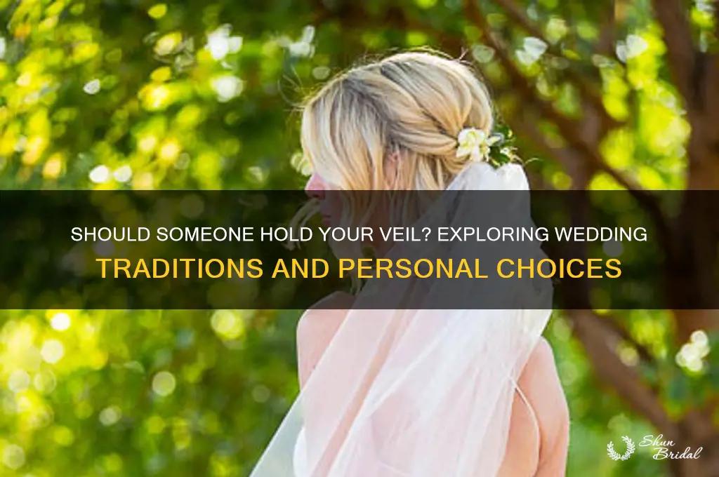 does someone need to hold your veil
