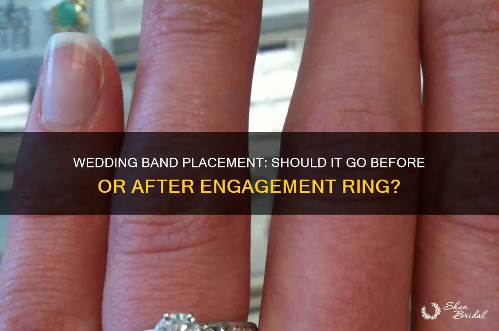 does wedding band go in front of engagement
