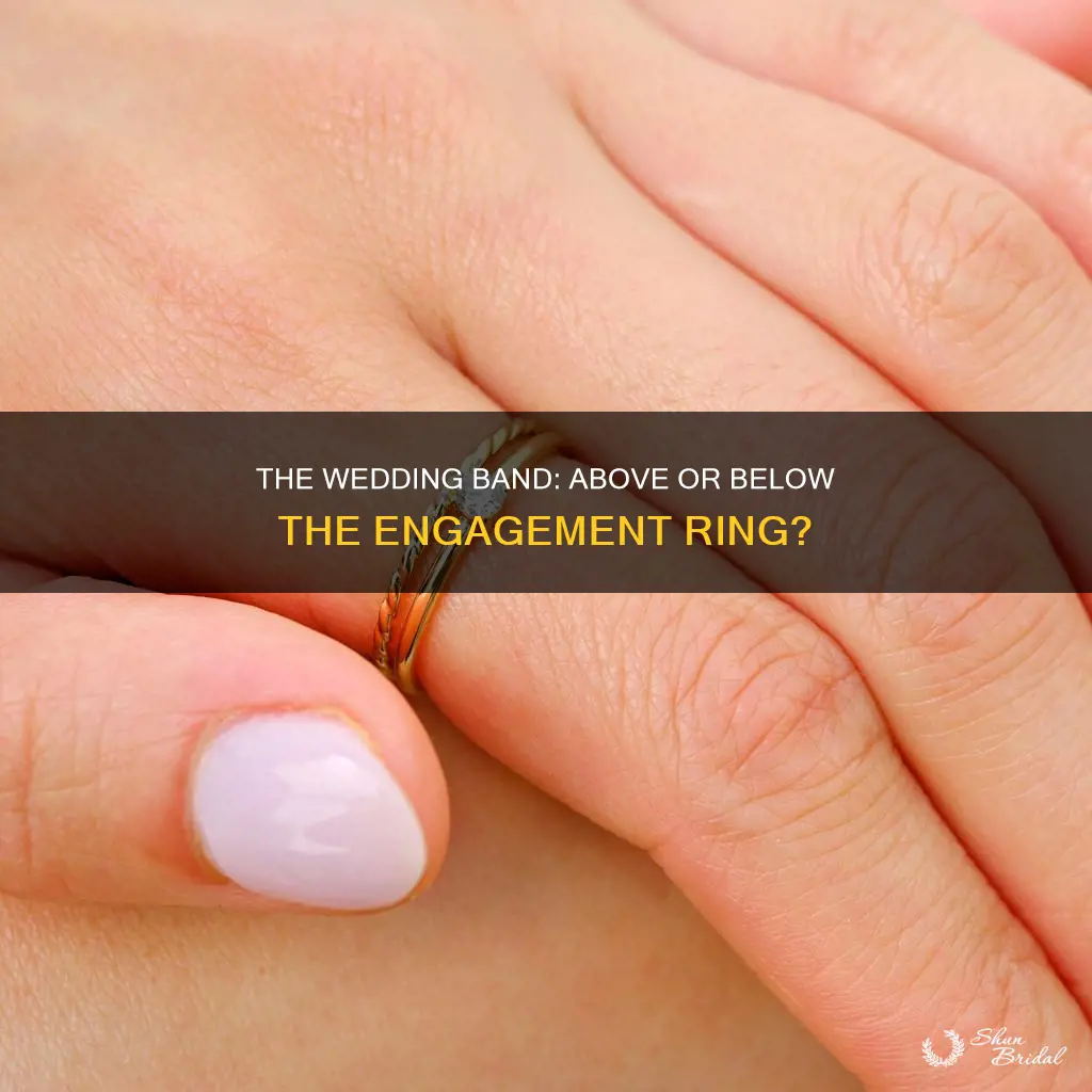does wedding band go on top of engagement ring