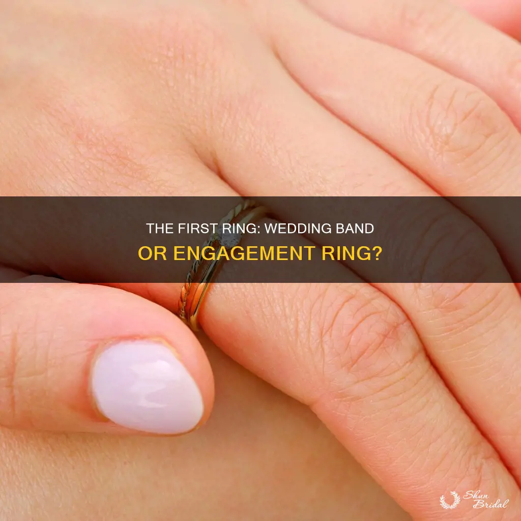 does wedding band or engagement ring go on finger first