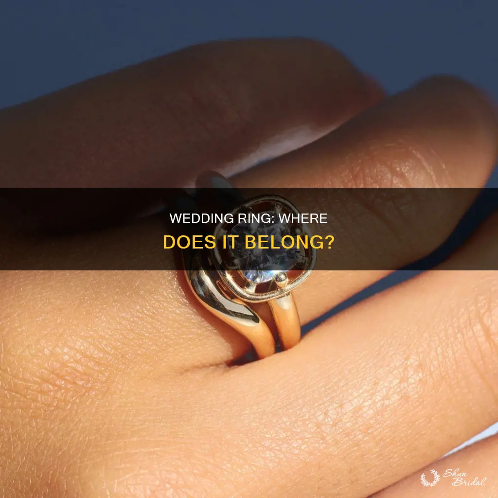 does wedding ring go outside of engagement ring