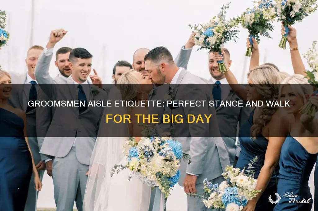 how do groomsmen stand to walk down aisle