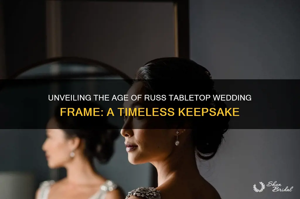 how old is russ tabletop wedding frame made