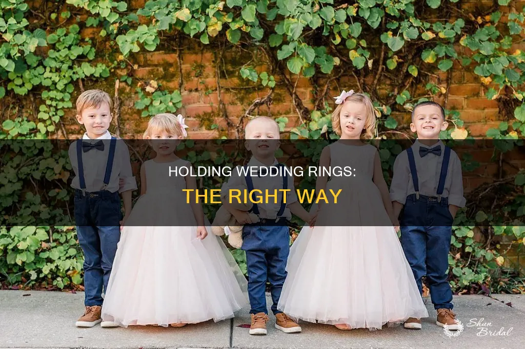 how really hold the rings in a wedding
