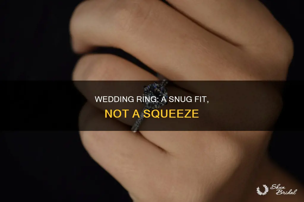 how tight should a wedding ring be