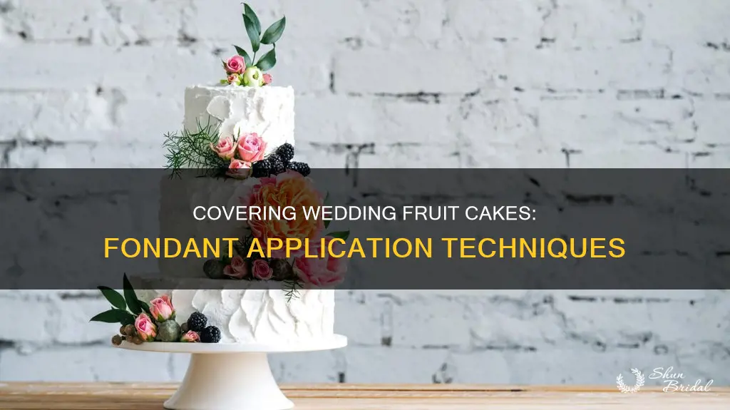 how to cover a wedding fruit cake with fondant