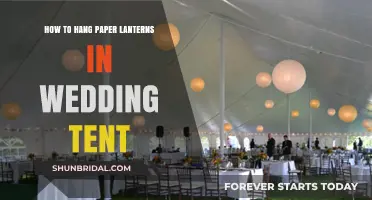 Elegant Tent Decor: Hanging Paper Lanterns for Your Wedding Celebration