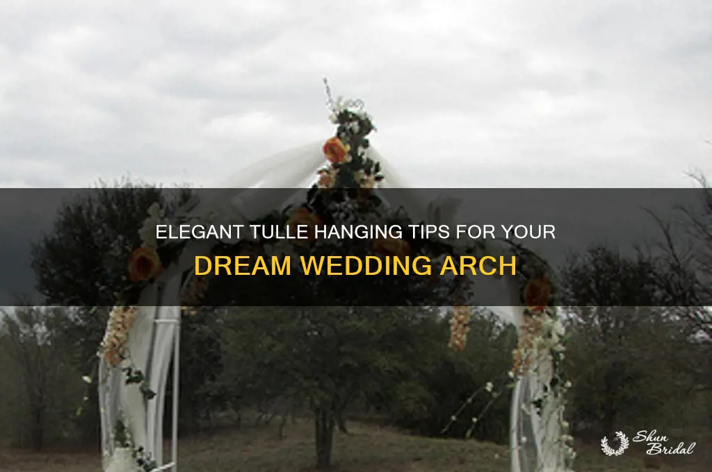 how to hang tulle on a wedding arch