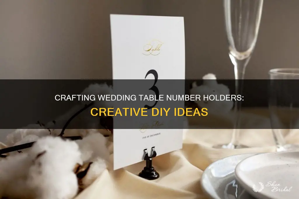 how to make table number holders for wedding