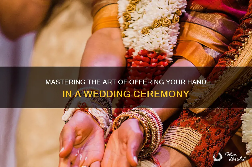 how to offer hand in wedding