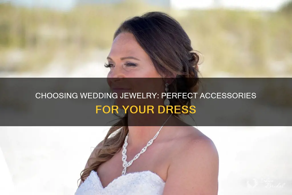 how to pick the right jewelry for your wedding dress
