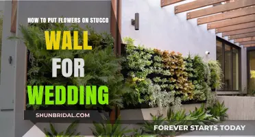 Stunning Wedding Flowers Adorn Stucco Walls