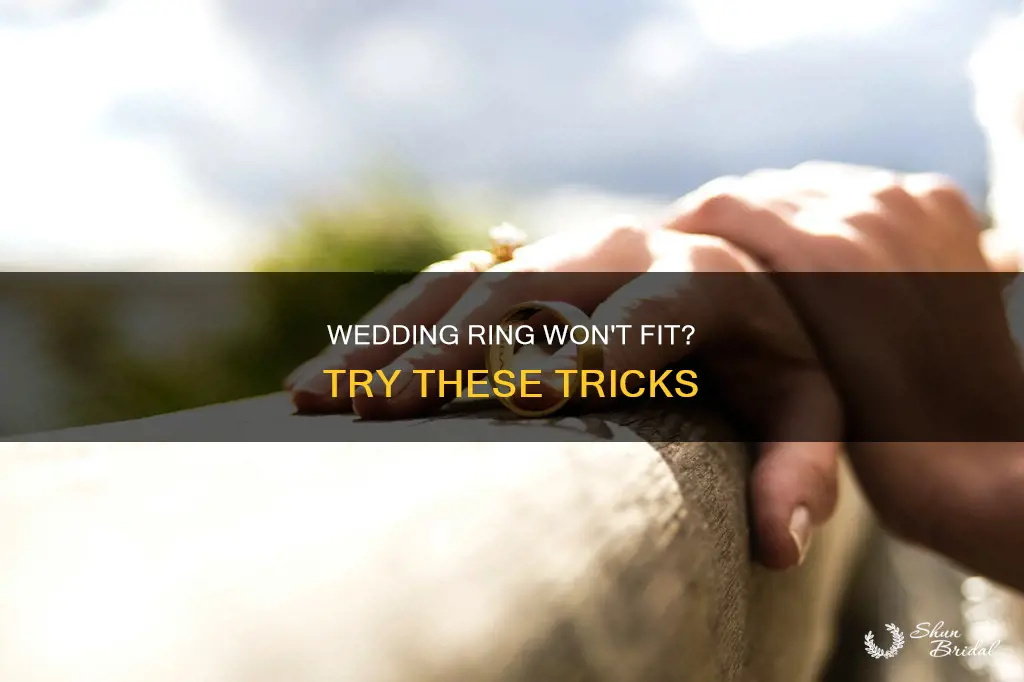 how to put on a tight ring at wedding
