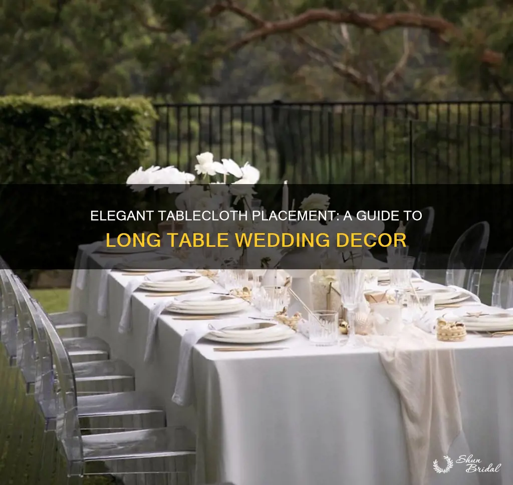 how to put tablecloths on long tables wedding