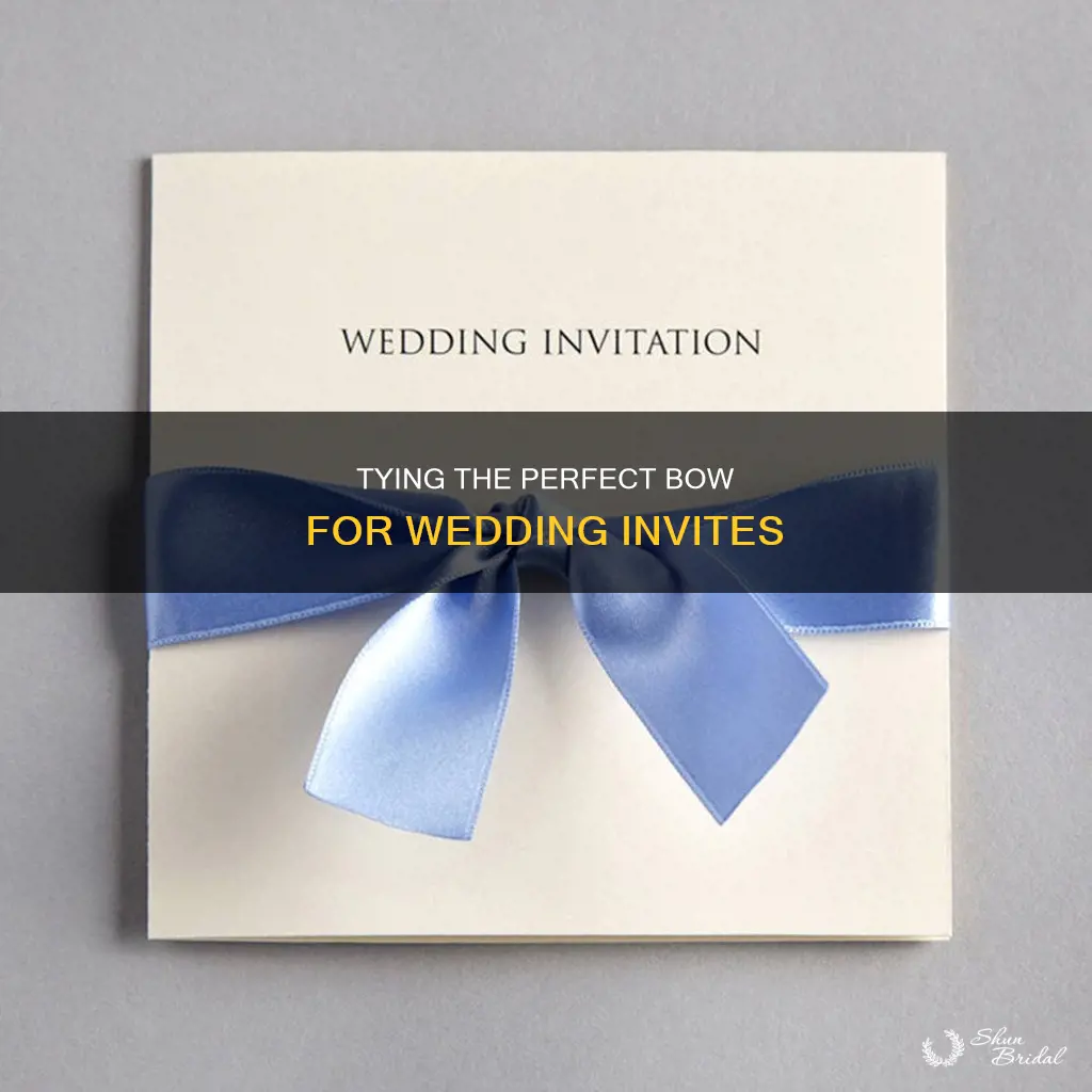 how to tie a bow around a wedding invitation