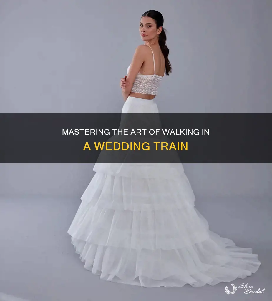 how to walk in a wedding dress with a train