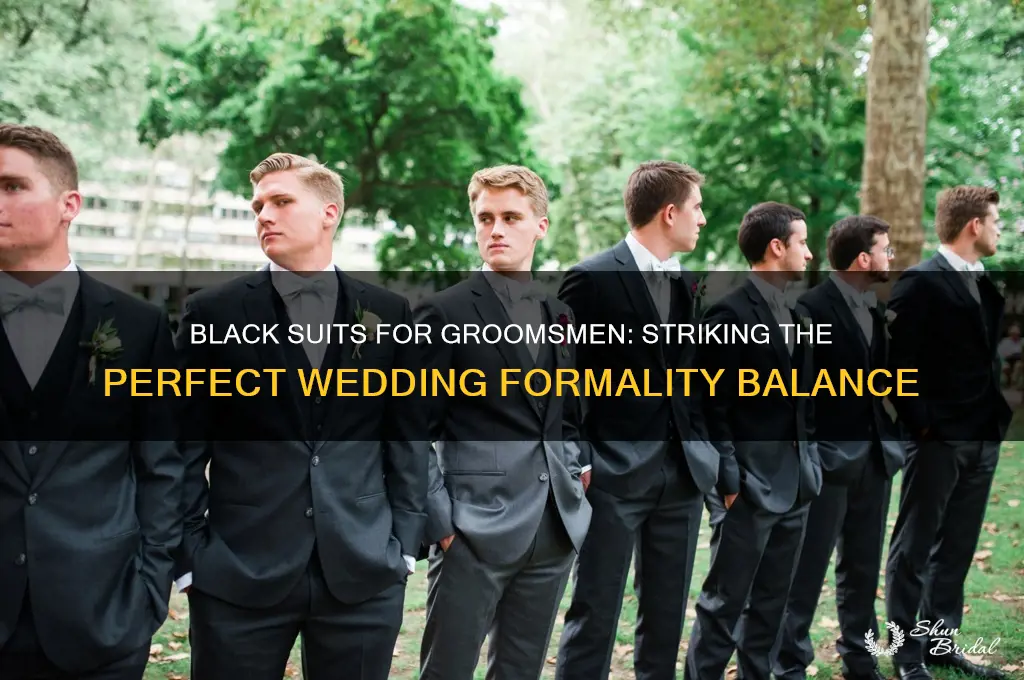 is black suit too formal for wedding groomsmen