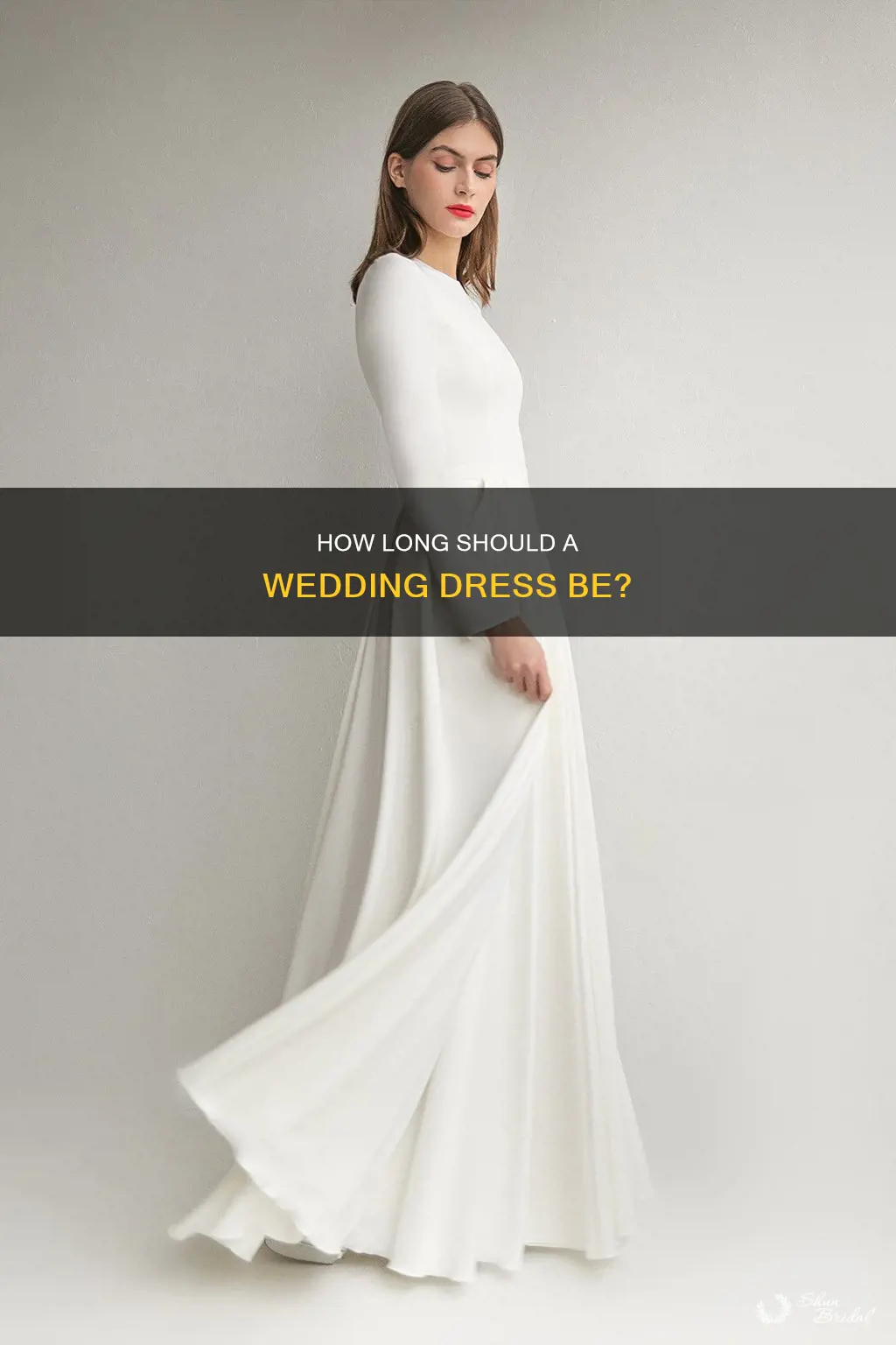 should a wedding dress touch the floor