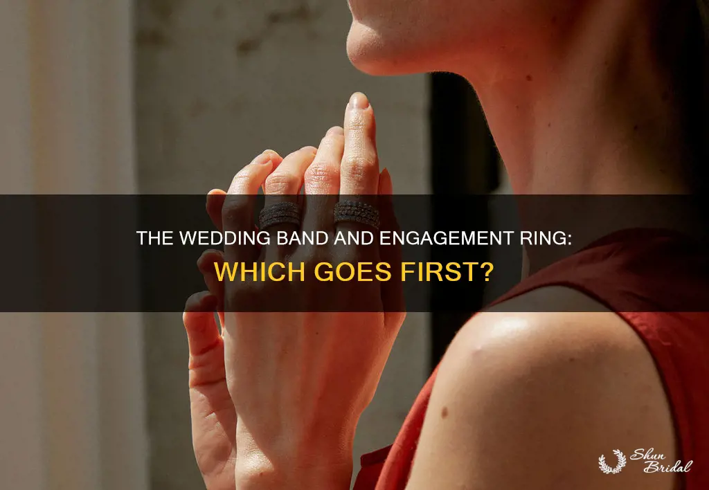 should engagement ring be worn in front of wedding band