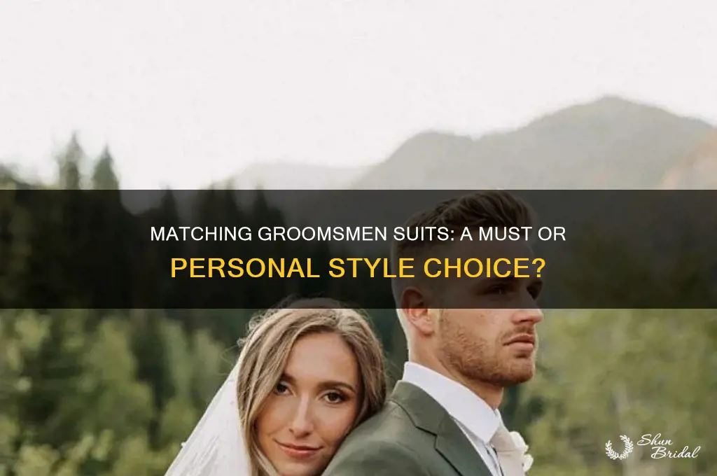 should groomsmen be matching suits