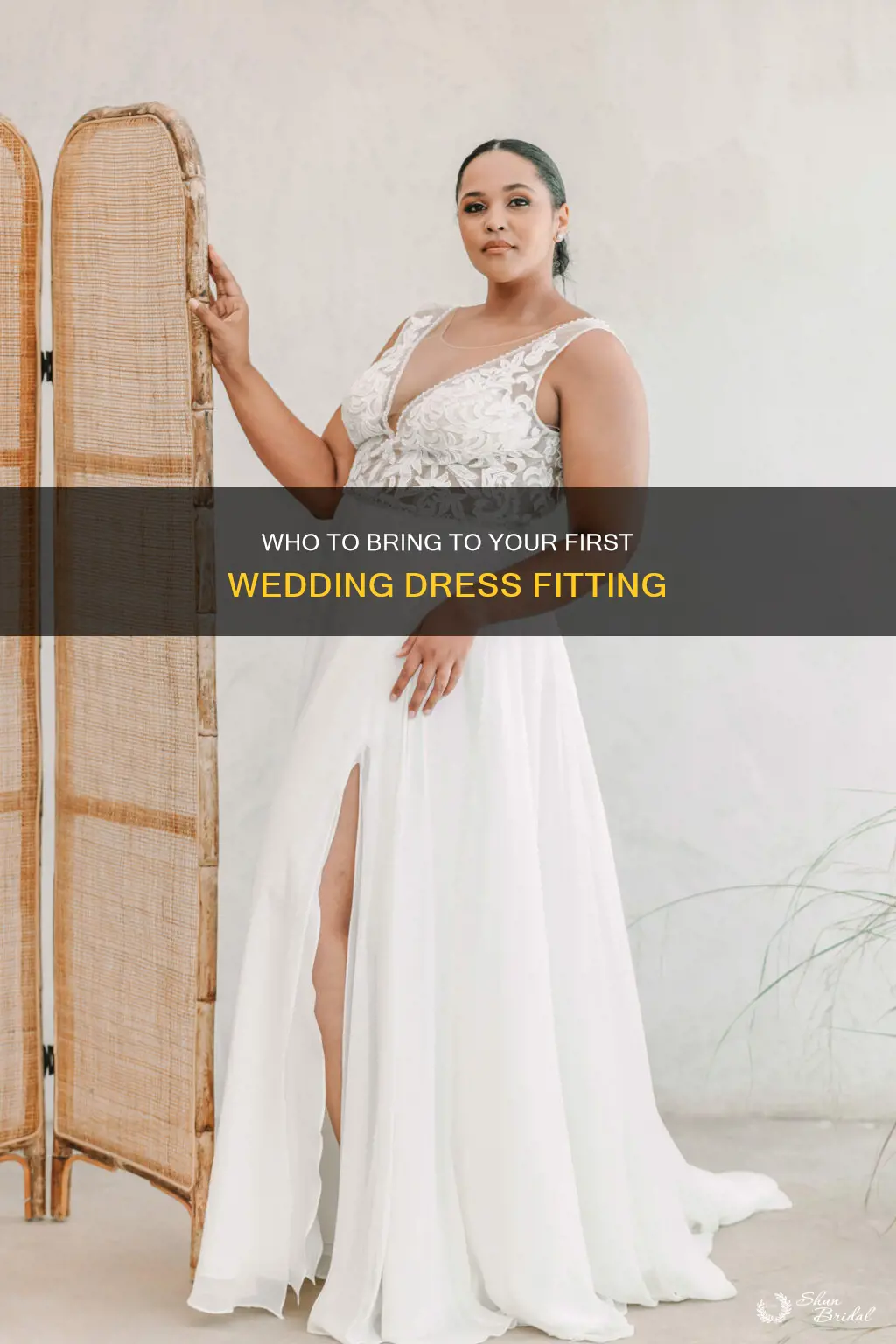 should I bring anyone to my first wedding dress fitting