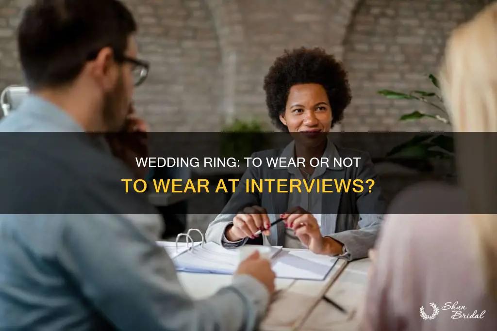 should I take off my wedding ring for an interview