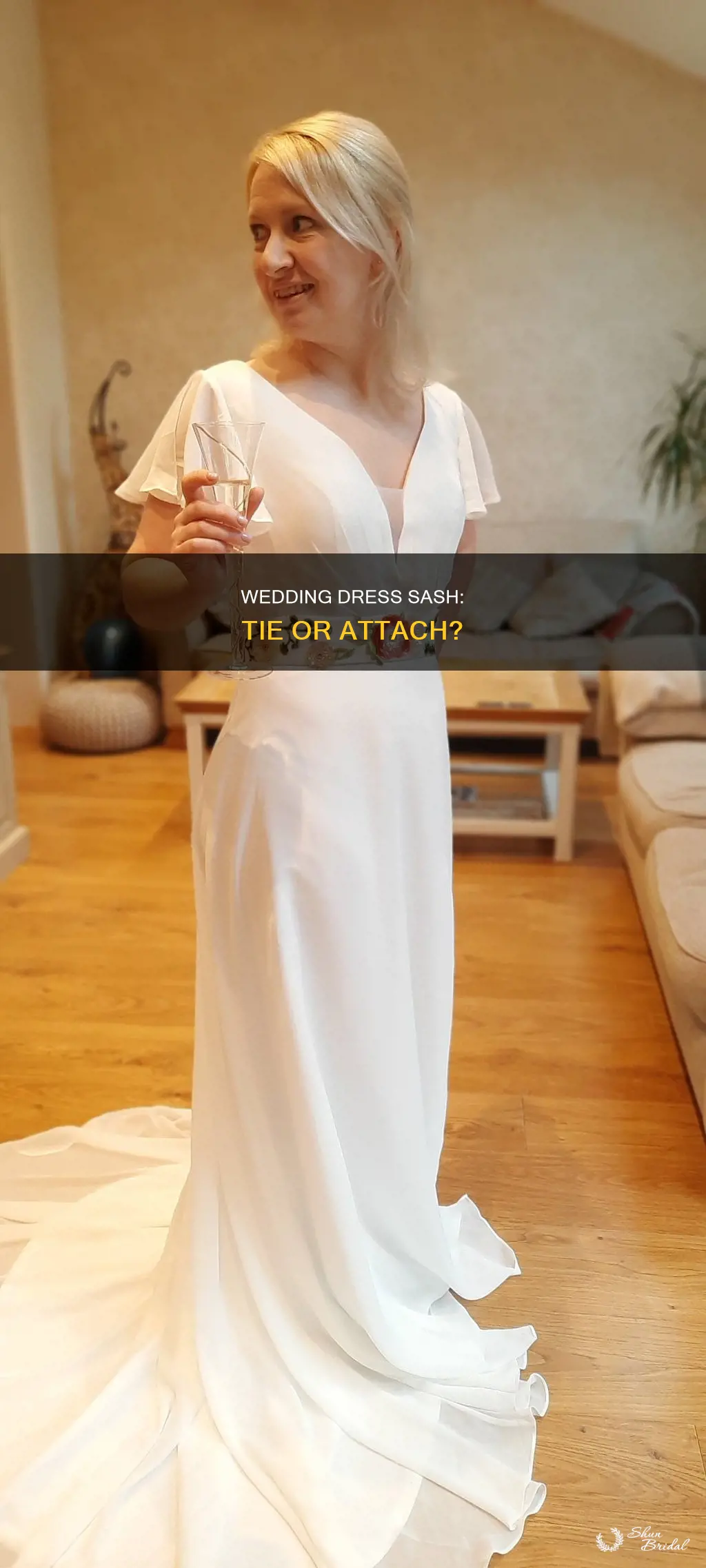 should wedding dress sash be tied or attached