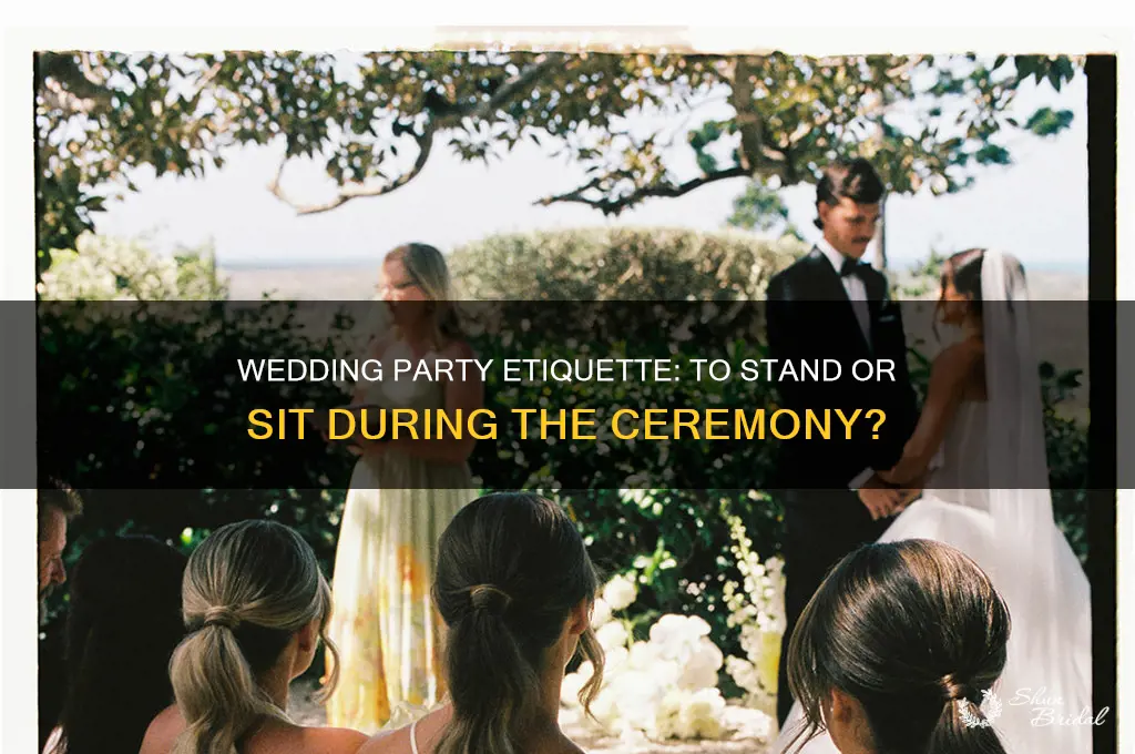 should wedding party stand or sit