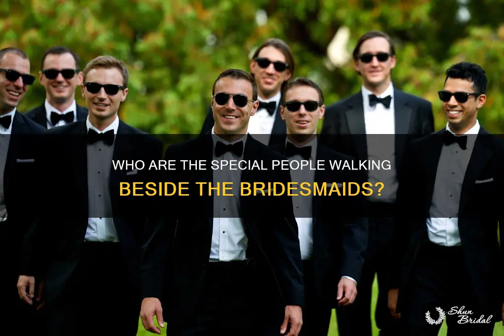 what are the nen called that walk with a bridesmaids