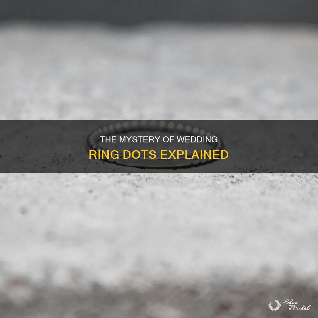 what are the small dots engraved in wedding rings