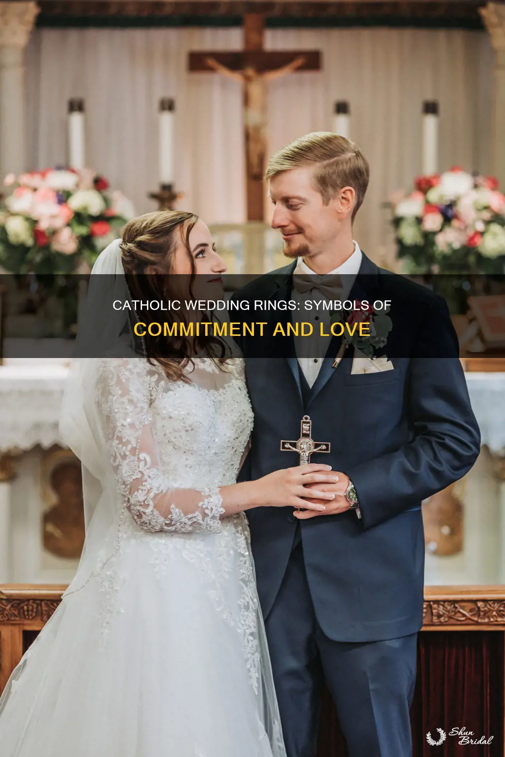 what do the rings at a catholic wedding symbolism
