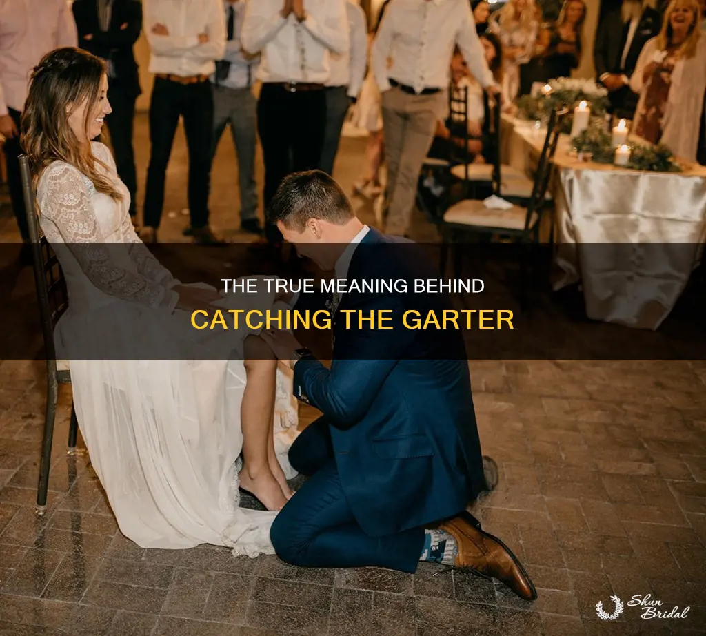 what does catching the garter at a wedding mean