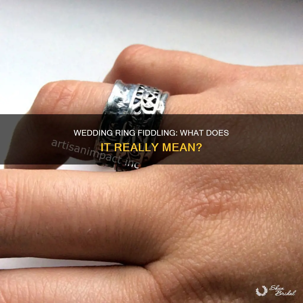 what does fiddling with wedding ring mean