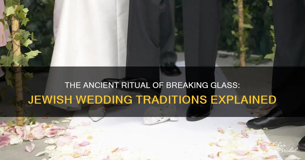 what does stomping a glass at jewish weddings mean