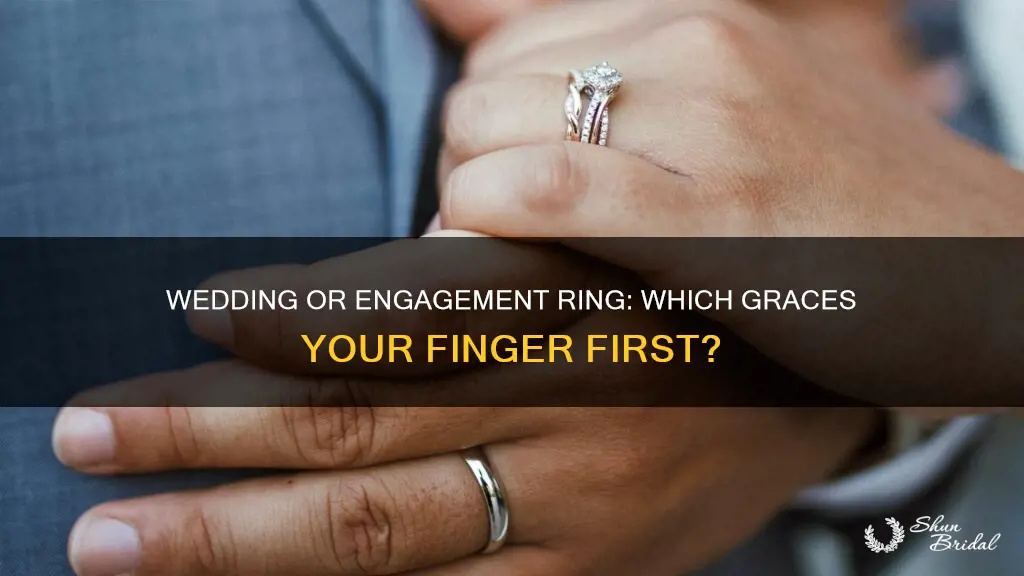 what goes on your finger first wedding or engagement ring