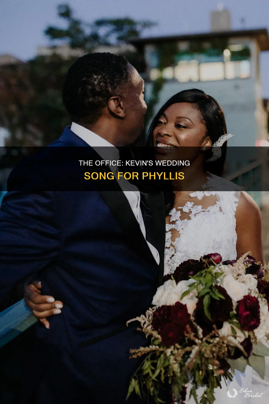 what is the song kevin plays at phyllis wedding