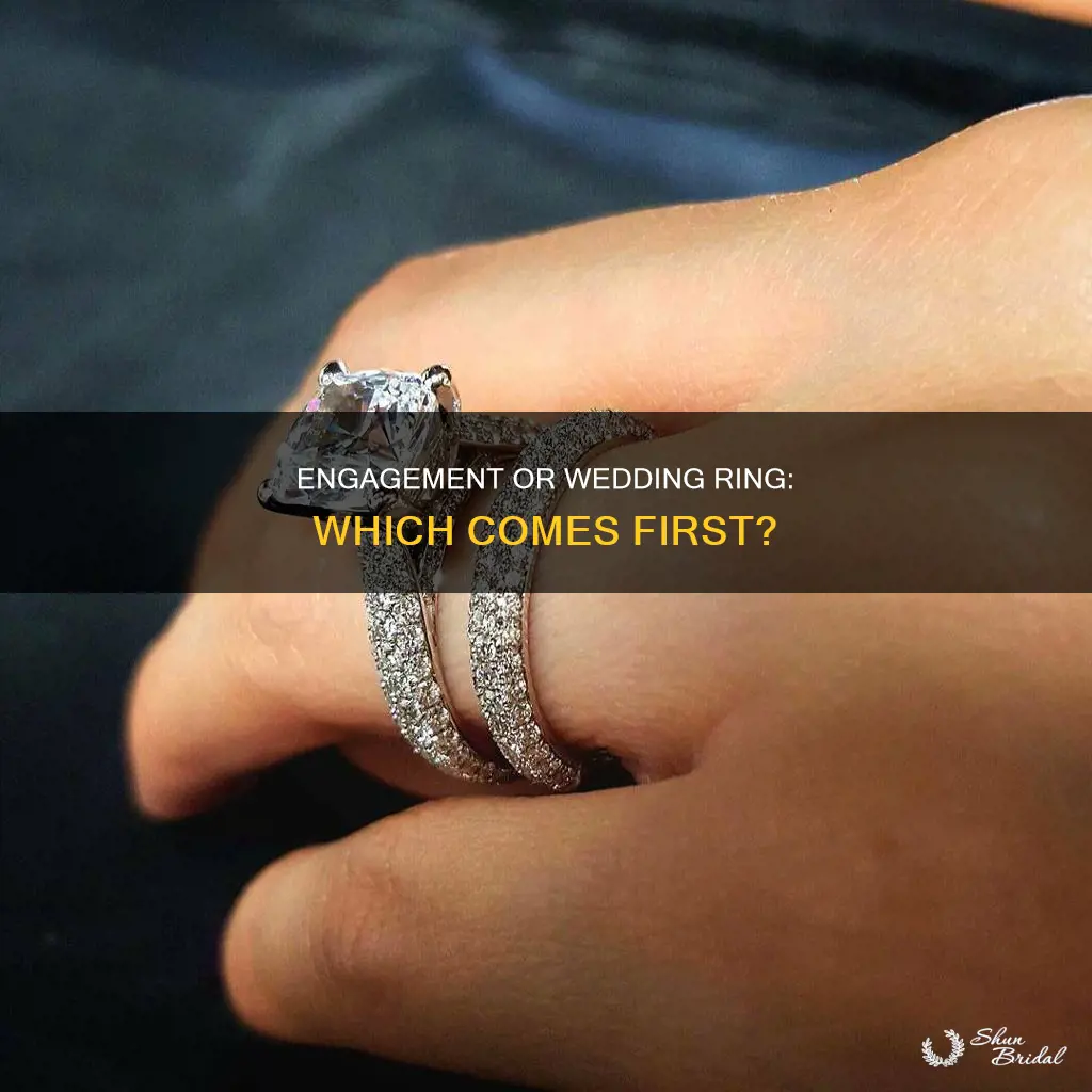 what to put first engagement or wedding ring