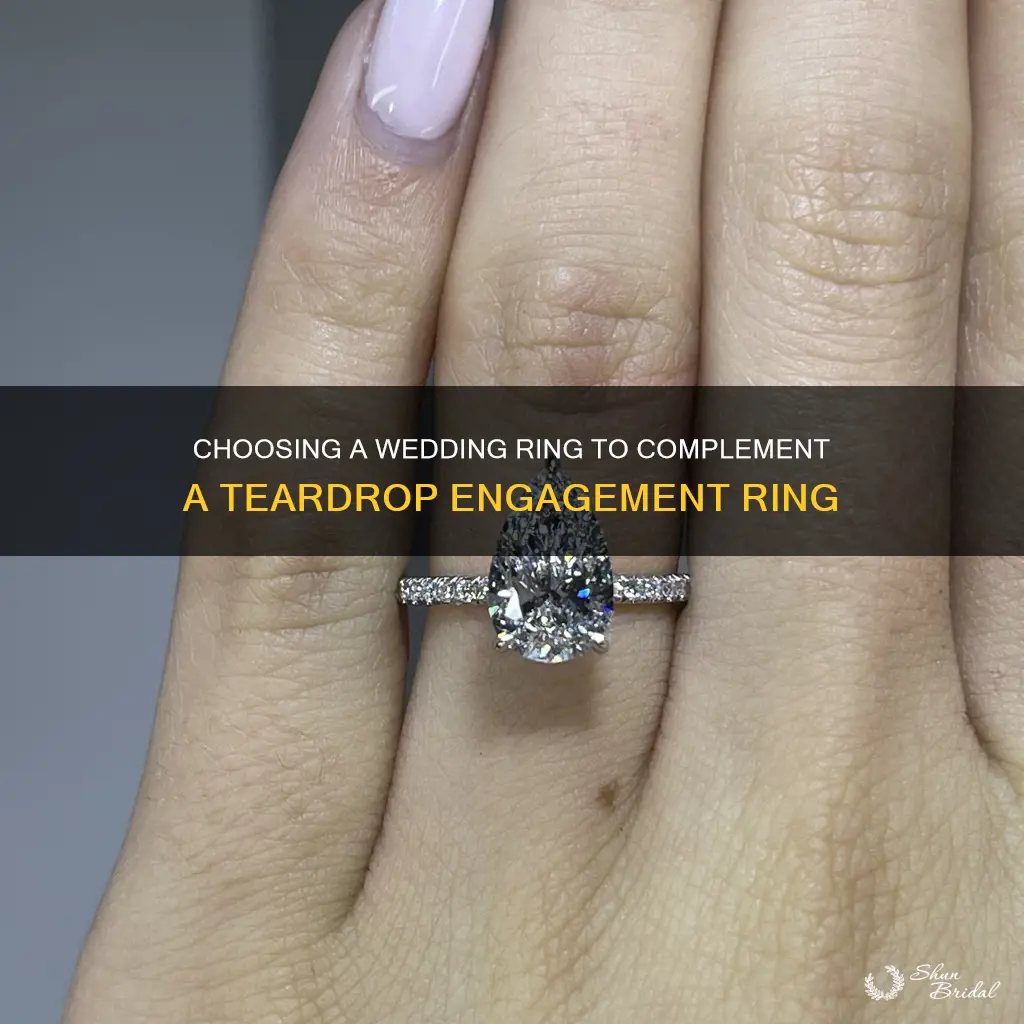 what wedding ring with tear drop engagment