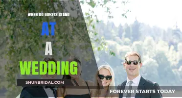 When Do Guests Stand at a Wedding: Etiquette Explained