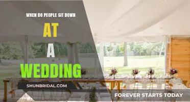 When Do Wedding Guests Sit? Timing and Etiquette Explained