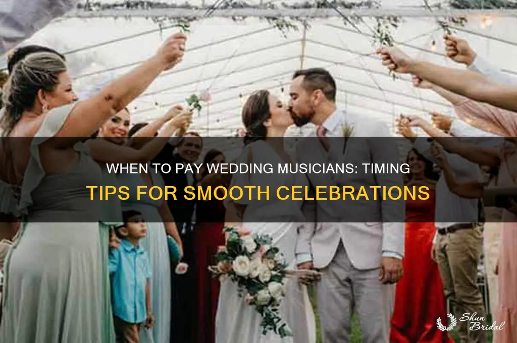 when to pay wedding musicians