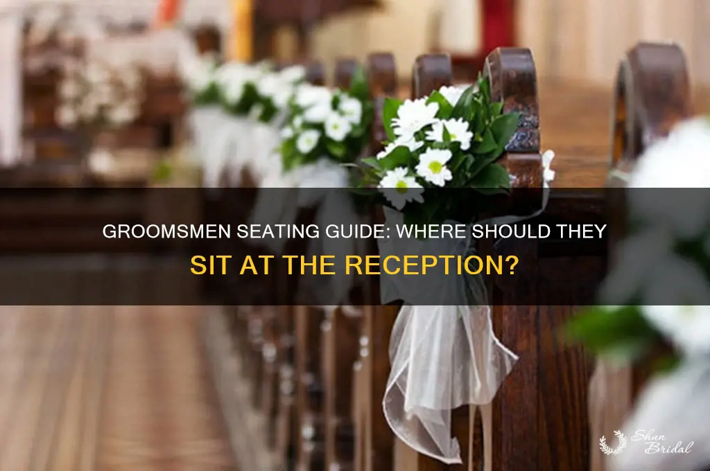 where do groomsmen sit at reception